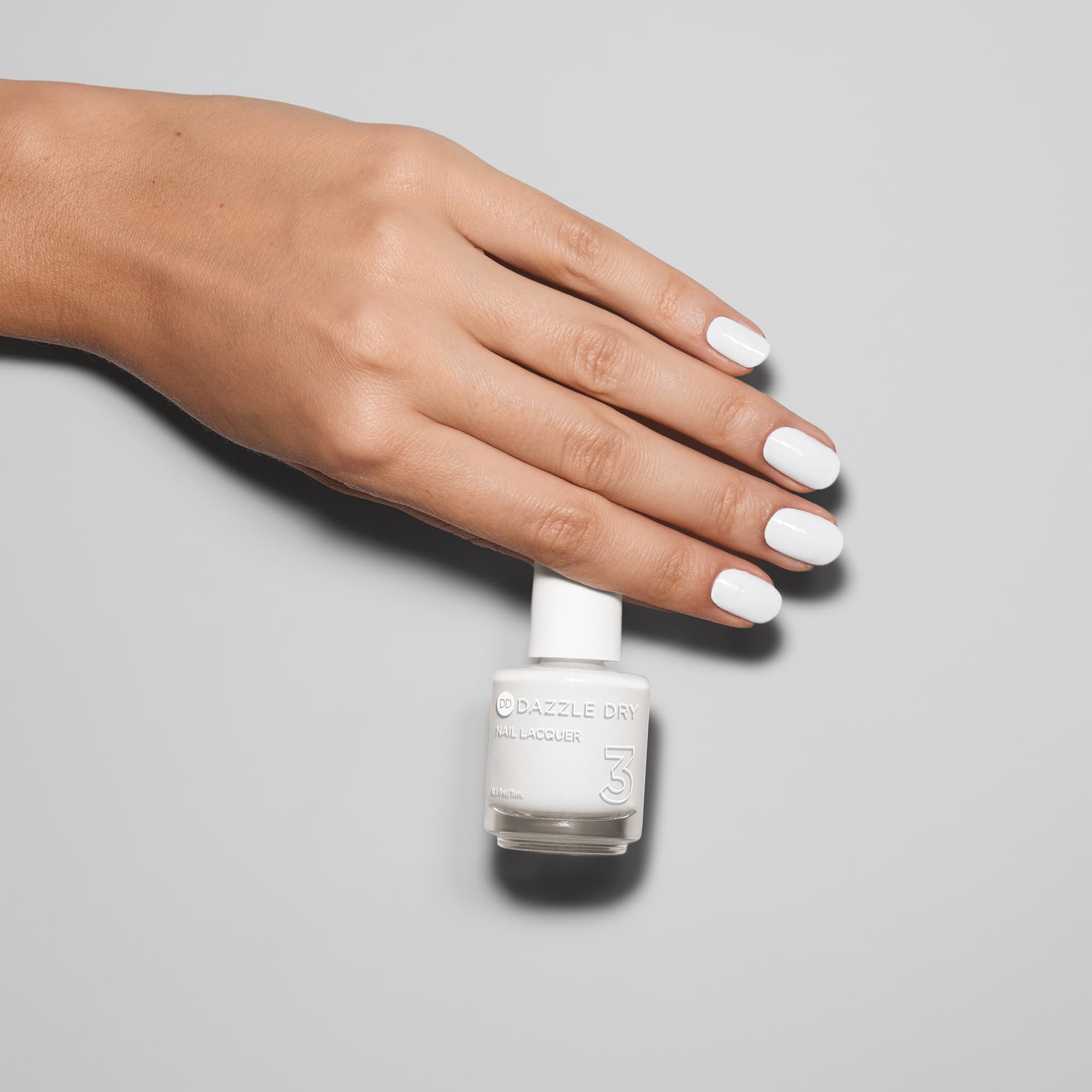 Dazzle Dry Nail Prep Step 1 swab readying surface for adhesion