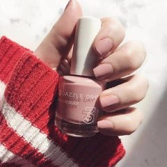 Dazzle Dry Step 3 lacquer application close-up for precise, fast-drying manicure.