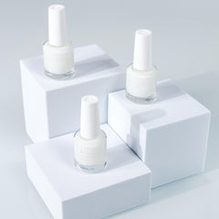 Dazzle Dry Base Coat bottle with a clear layer to boost adhesion.