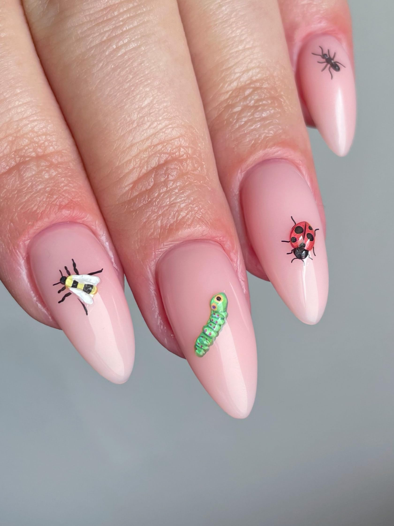 Deco Beauty Critters Nail Stickers on fingernails demonstrate easy, long-lasting wear for daily style.