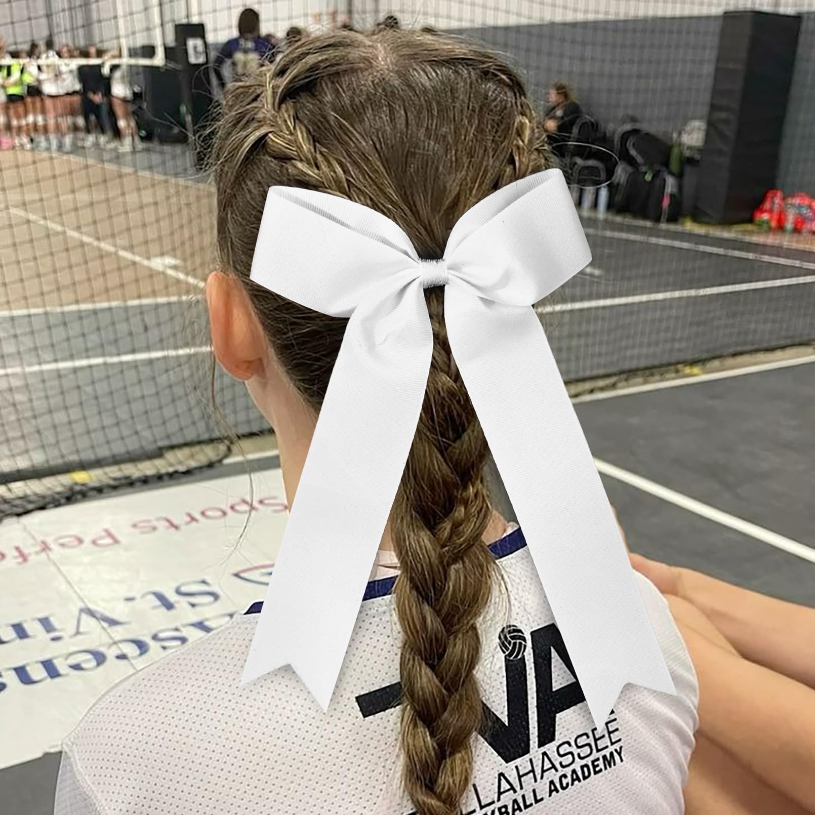 DEEKA bows display ribbon tails for playful, eye-catching look