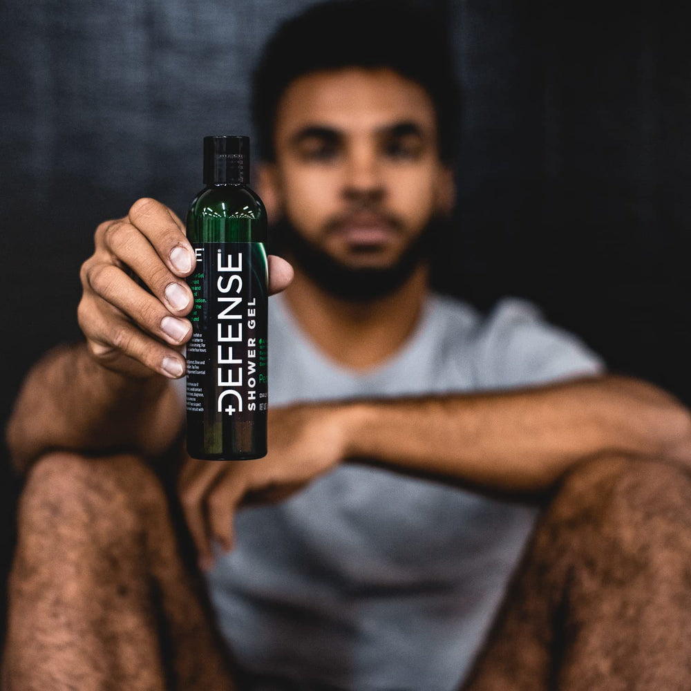 Defense Soap Peppermint Tea Tree Body Wash athlete-use lifestyle shot for post-workout refresh.