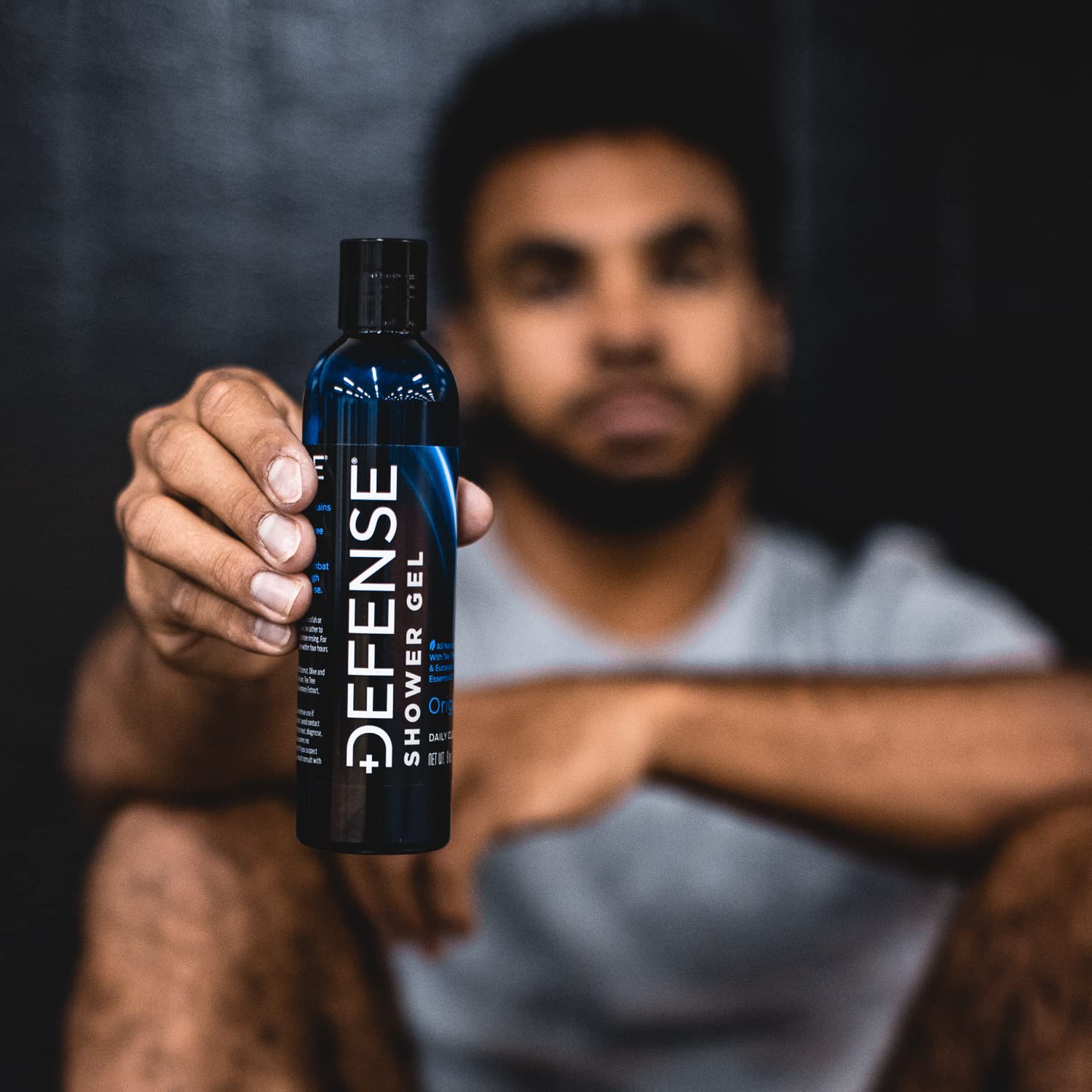 Defense Soap Tea Tree Body Wash odor-control use case shown with gym gear