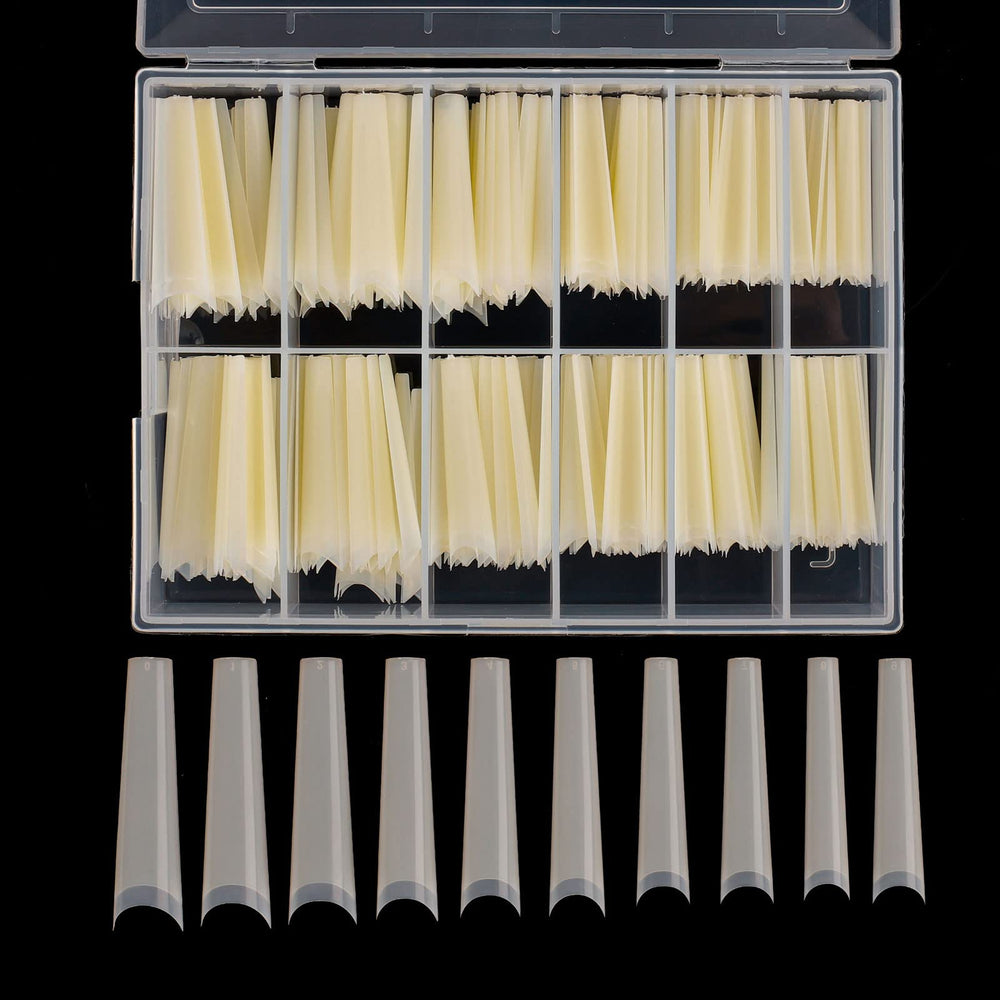 Defuber tapered extra long nail tips in the clear box for easy selection.
