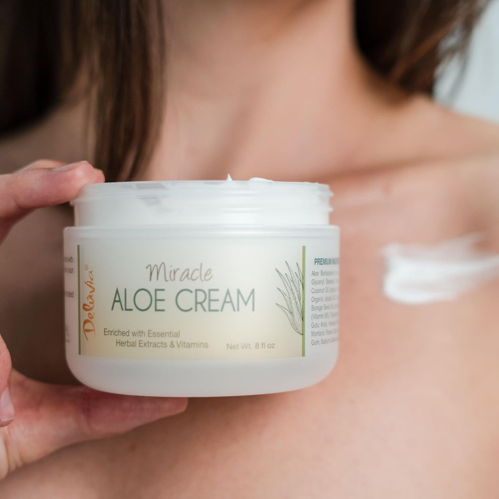 DELÚVIA Miracle Aloe Cream organic aloe leaf highlights soothing hydration.