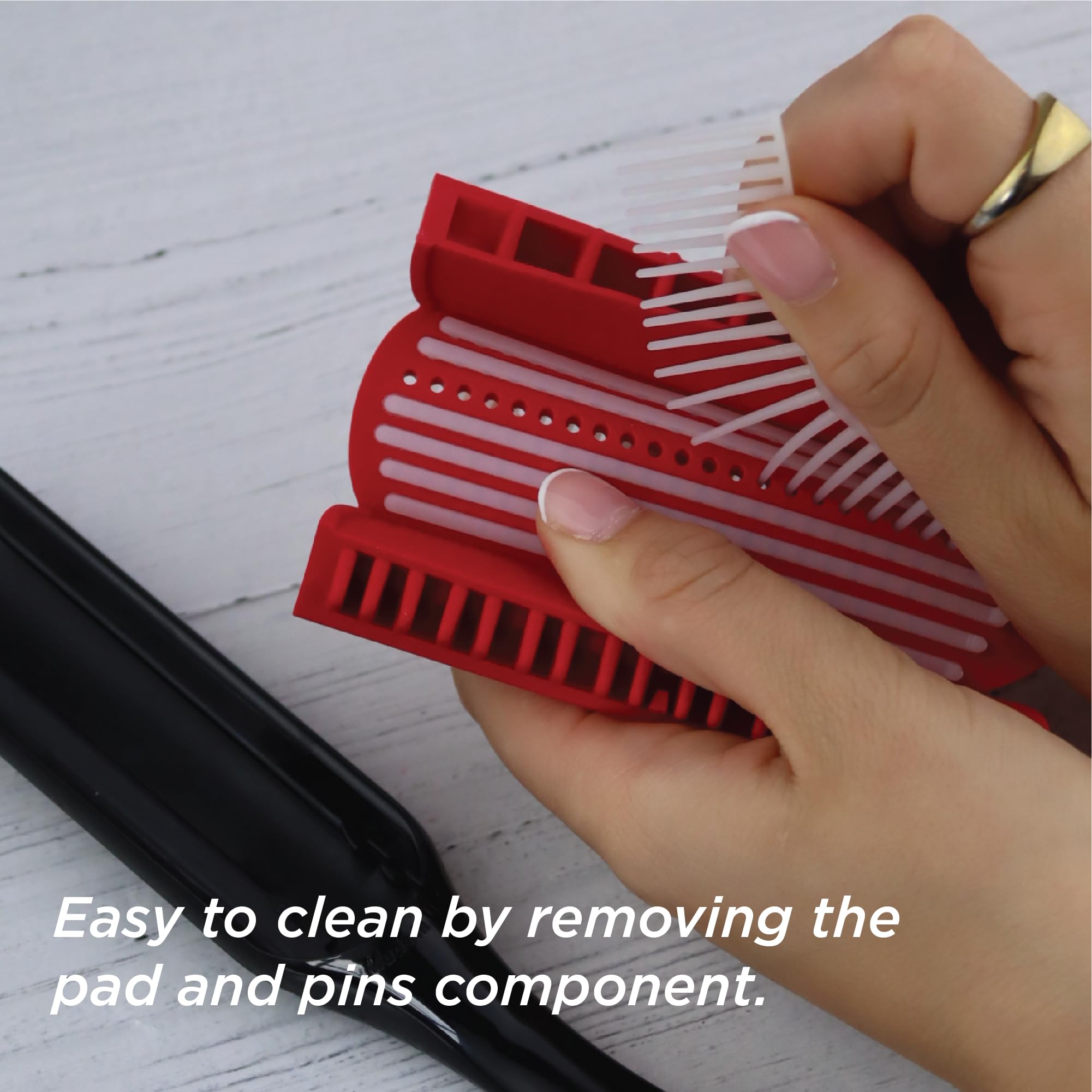 Denman Curly Hair Brush D3 anti-static nylon pins glide through hair.