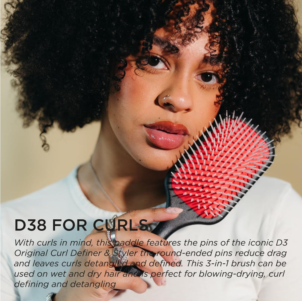 Denman D38 curl-definition styling brush delivering defined curls with minimal frizz.