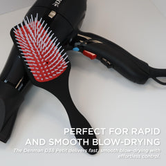Denman D38 paddle brush with cushioned mat for head contour comfort.