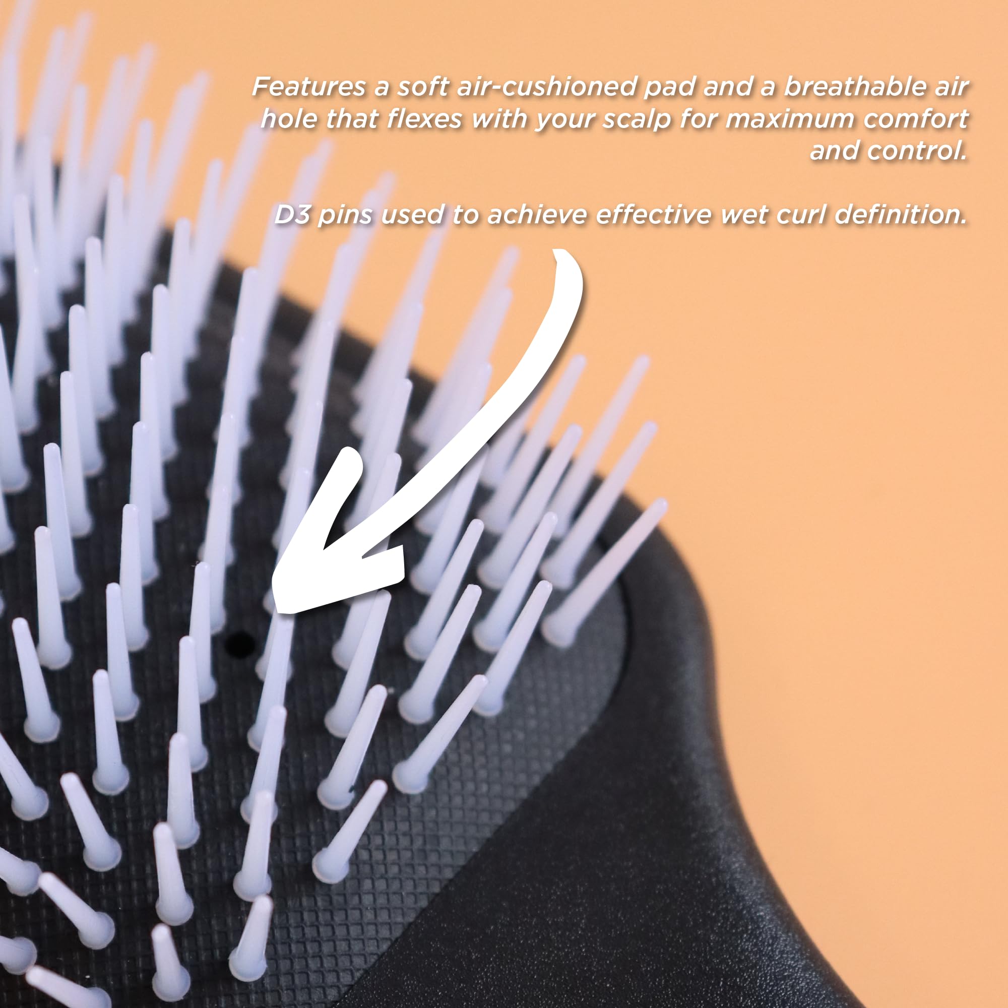 Denman D38 scalp-massage close-up illustrating gentle scalp stimulation.