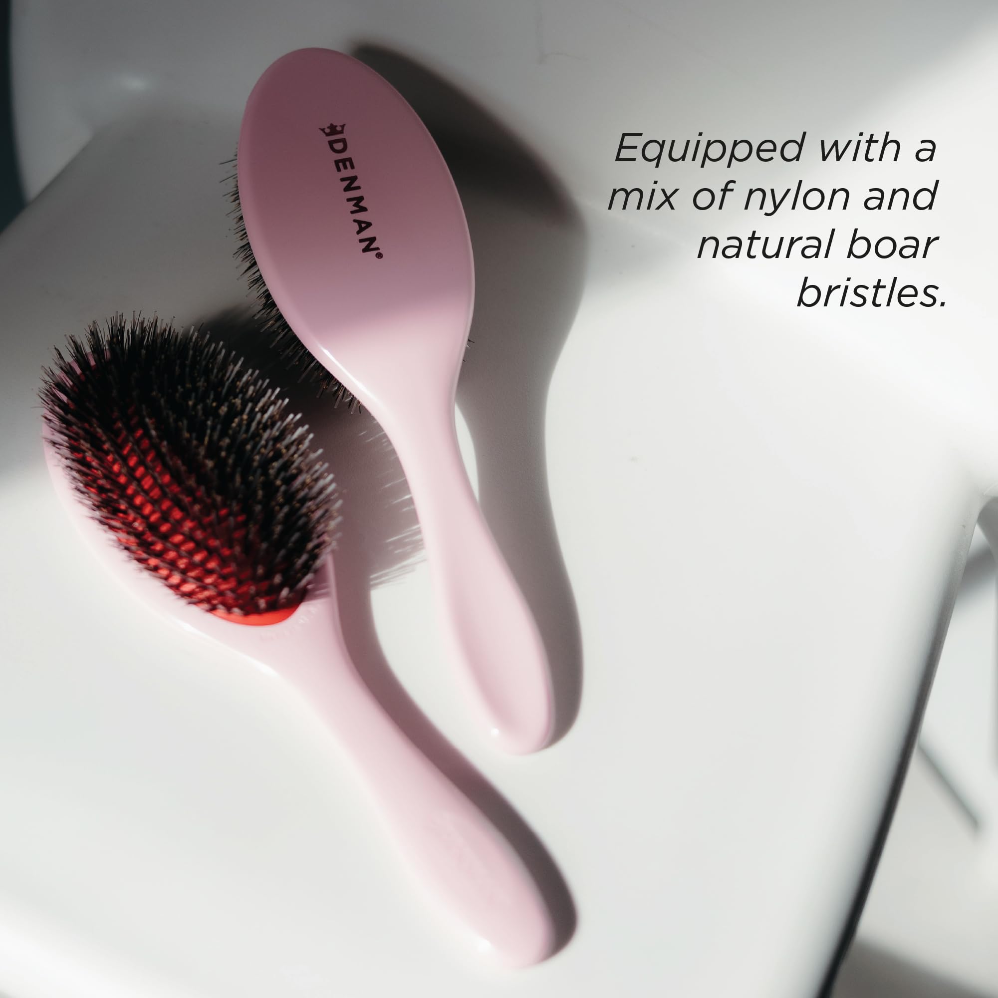Denman D81M pink crush on damp hair distributing natural oils for shine.