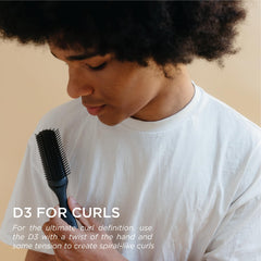 Denman Jack Dean D3 tear-drop ergonomic handle provides comfort and balance during styling.