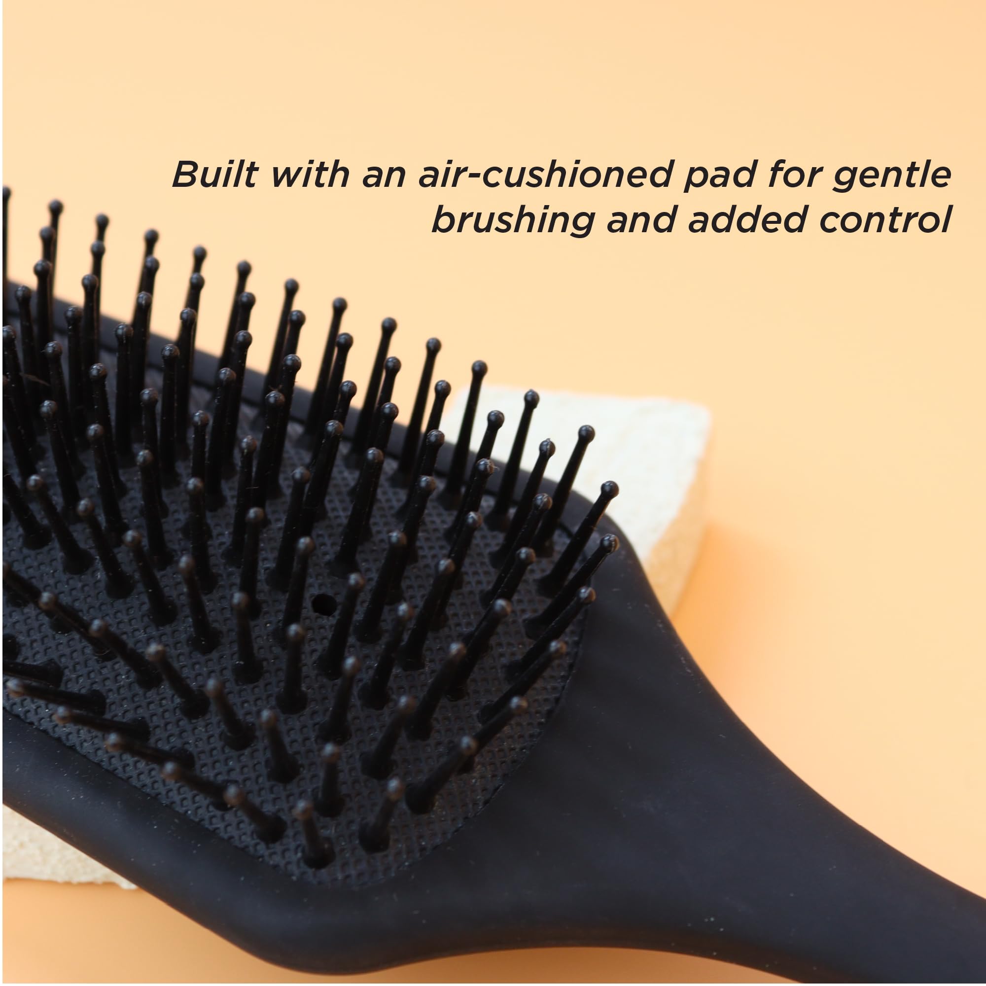 Denman Mini Paddle Brush ideal for on-the-go grooming routines.