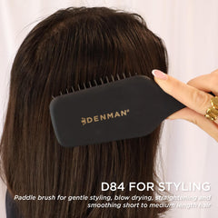 Denman Mini Paddle Brush rapid blow-drying with efficient bristle spacing.