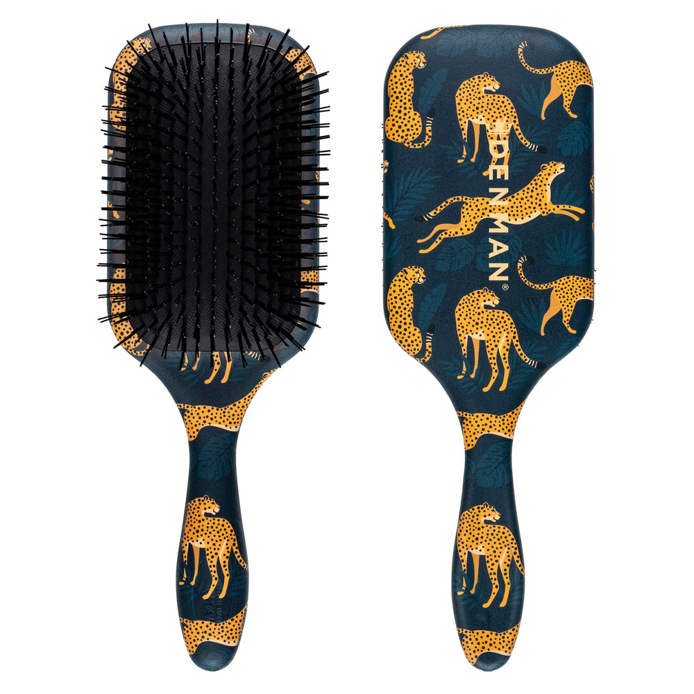 Denman Ultimate Detangling Brush paddle closeup showing knot-smoothing action for long hair