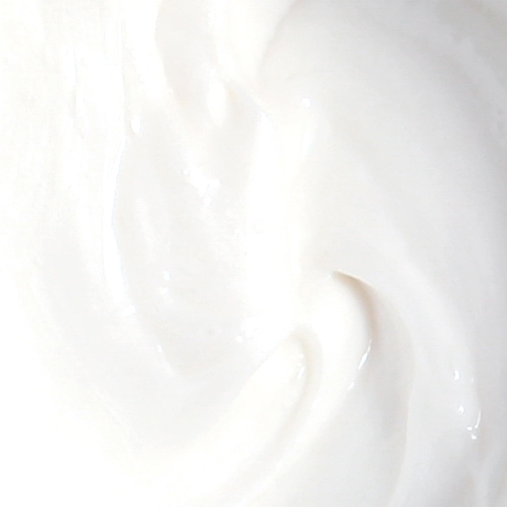 Derma E cream on skin demonstrates calm, hydrated skin after application.