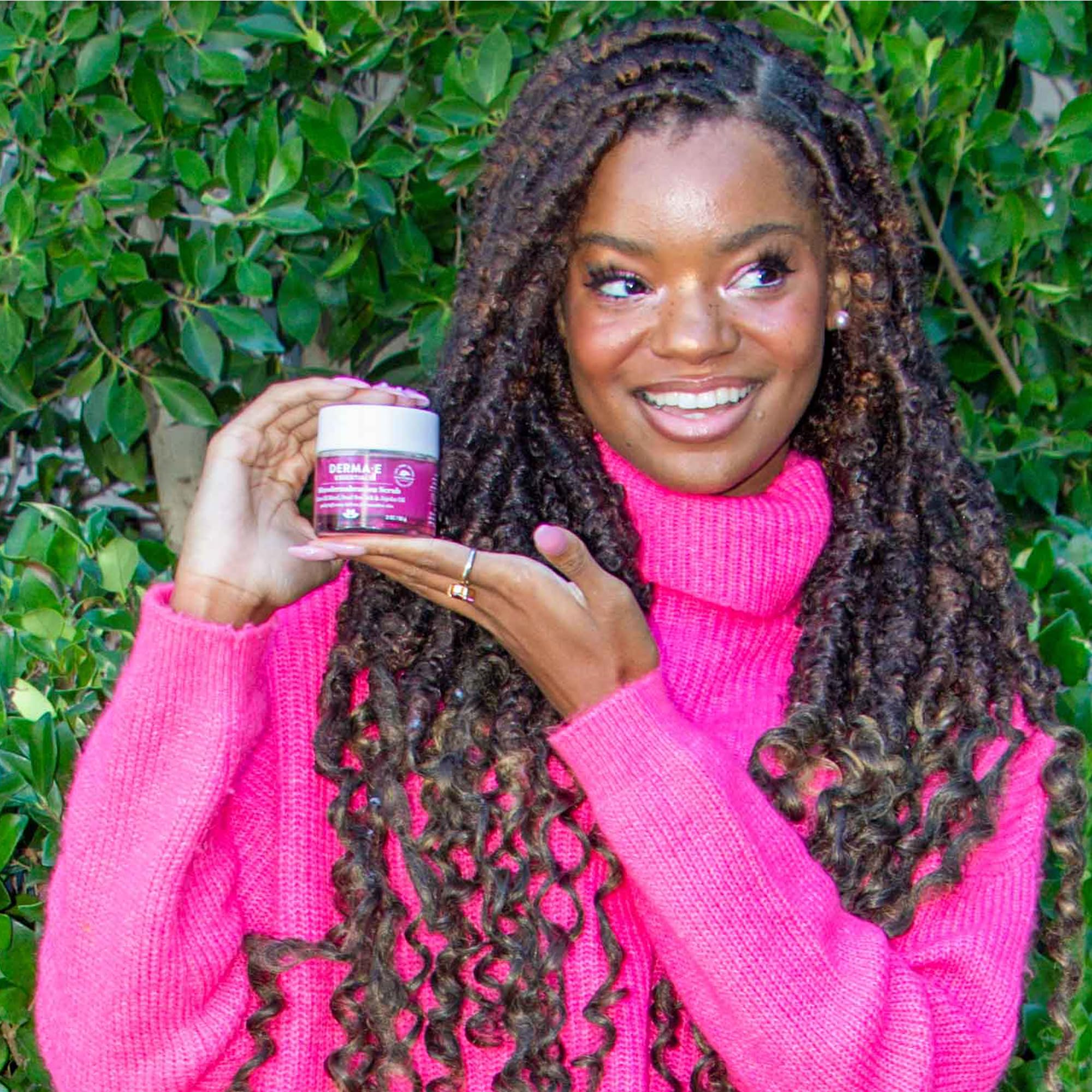 Derma E scrub being applied to damp hand in a skincare routine
