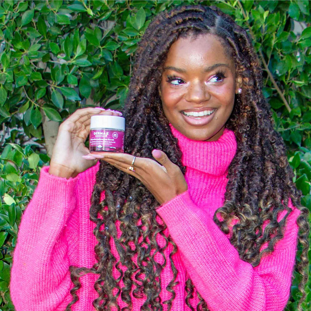Derma E scrub being applied to damp hand in a skincare routine