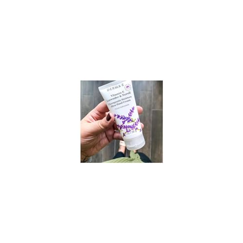 Derma E shea butter-rich cream in action, smoothing dry hands.
