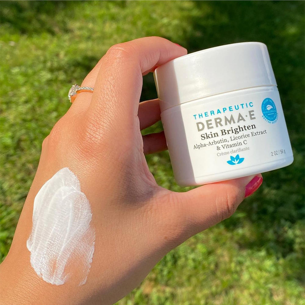 Derma E Skin Brightening Cream label highlights vegan, no-bleach formula.