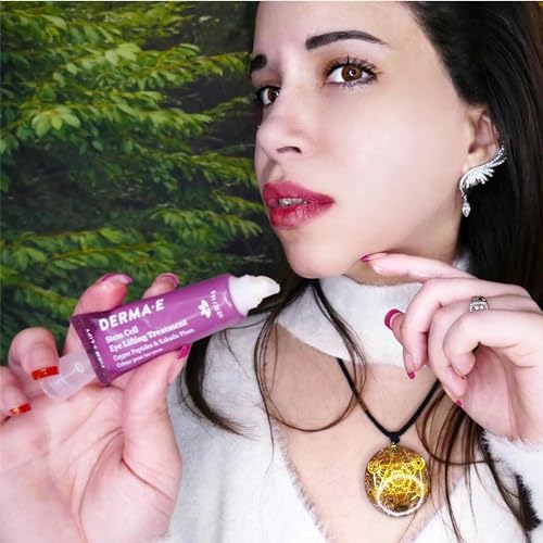 Derma E Stem Cell Lifting Eye Treatment under-eye application on skin, promoting refreshed, hydrated eyelids.