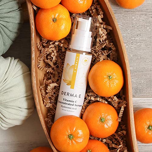 Derma E Vitamin C Serum applying with fingertips emphasizes smooth daily skincare routine.