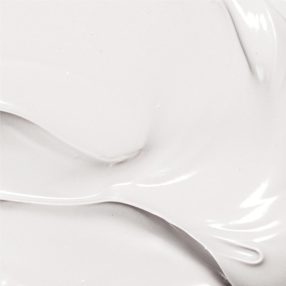 Derma E Vitamin E Lavender Neroli lotion applying to dry elbows demonstrates targeted moisturizing