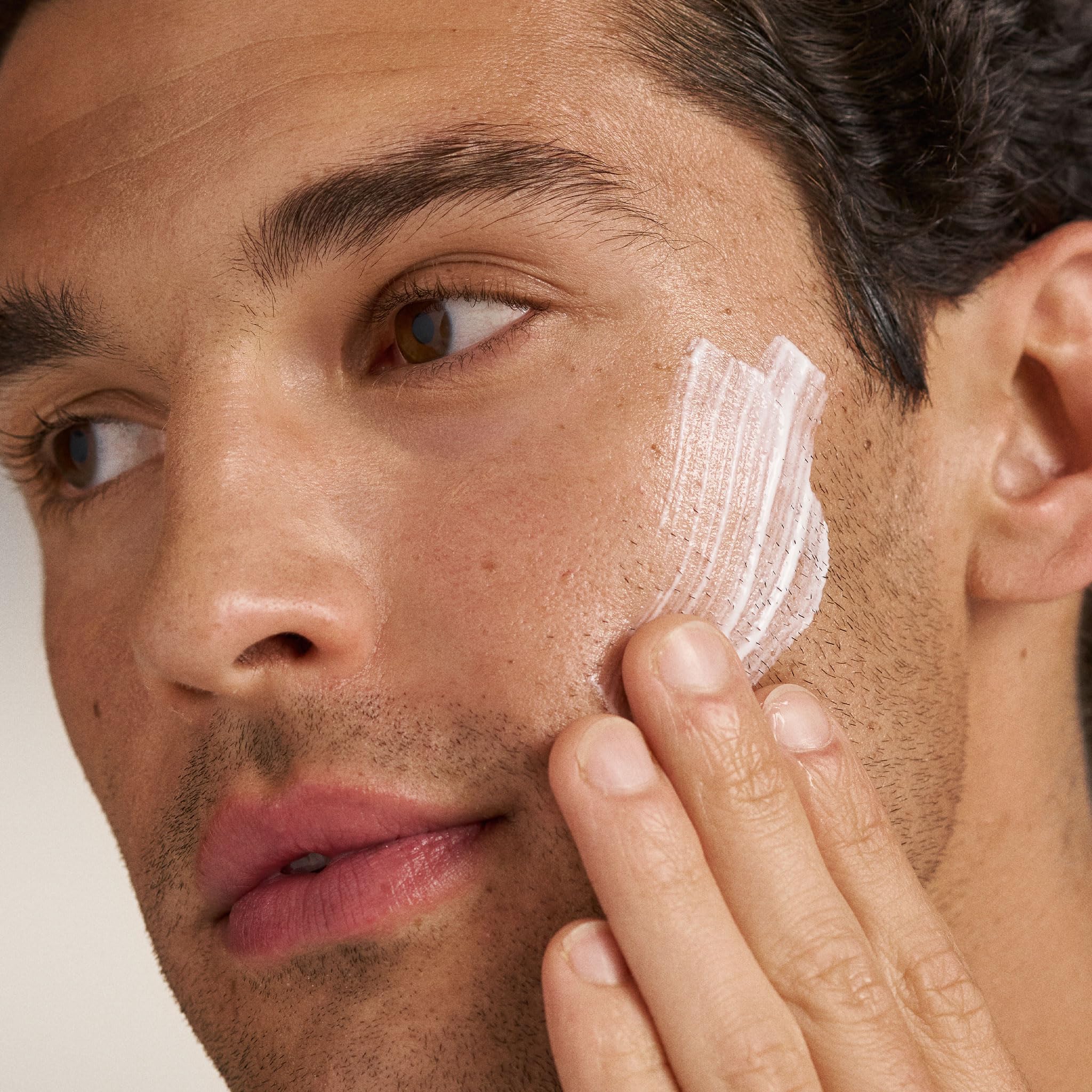 Dermalogica PowerBright Moisturizer SPF50 cream texture close-up emphasizes hydration.