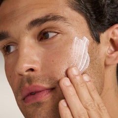 Dermalogica PowerBright Moisturizer SPF50 cream texture close-up emphasizes hydration.
