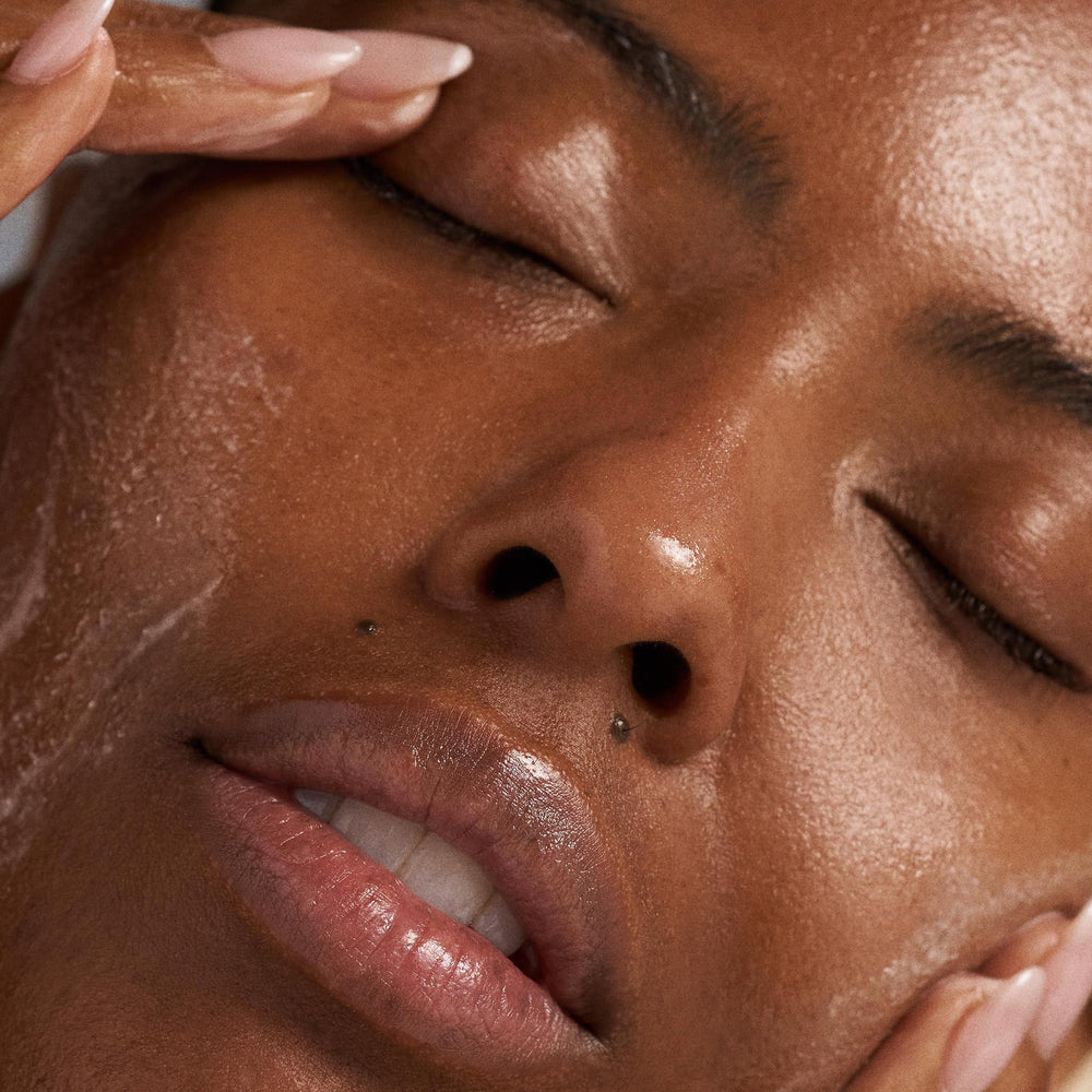 Dermalogica Precleanse oil massaging onto skin for makeup removal.