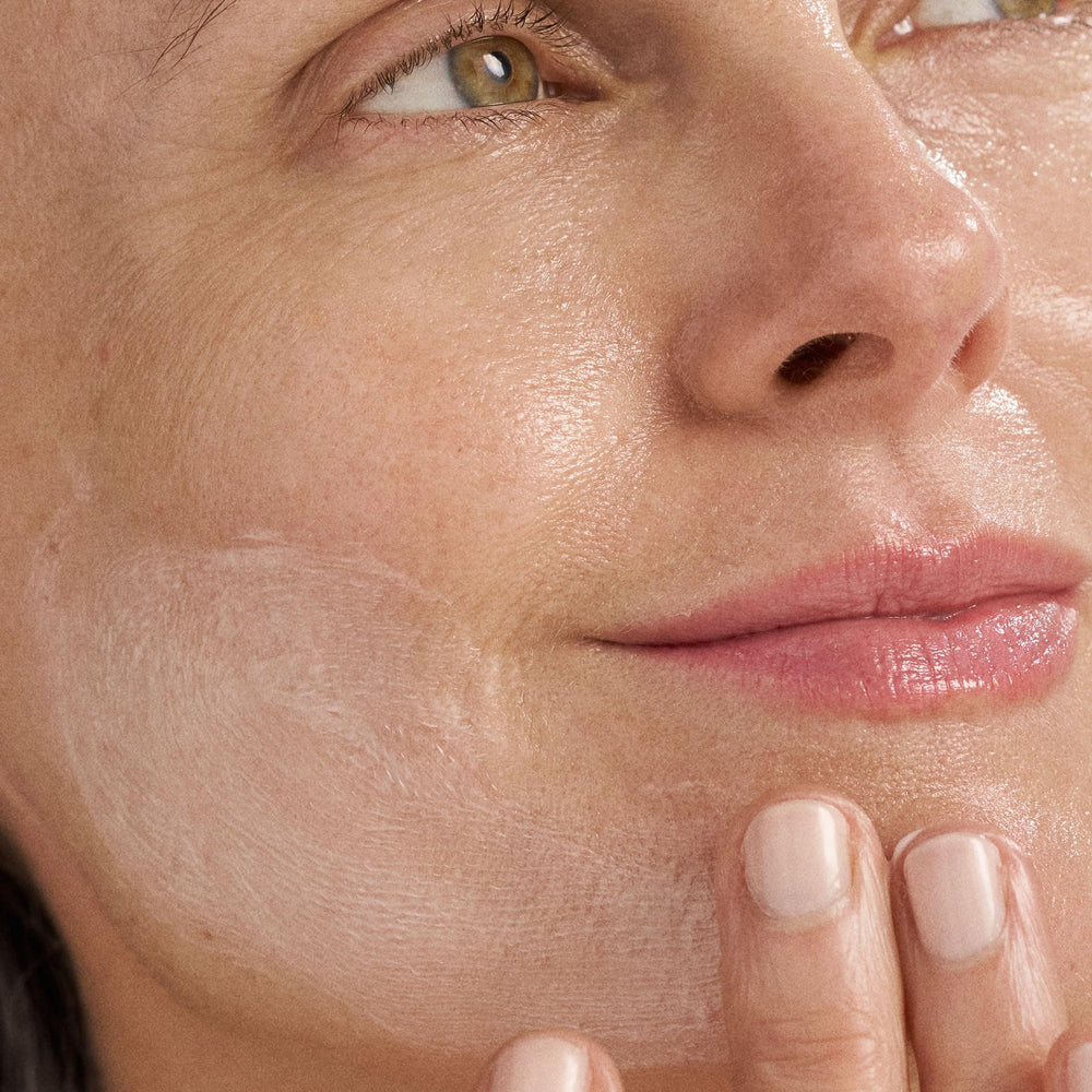 Dermalogica Super Rich Repair cream swirl shows thick, protective moisture for skin.