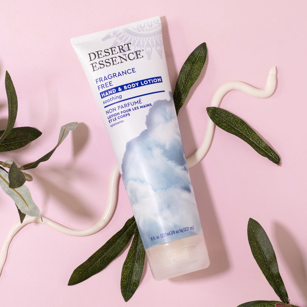 Lotion being applied to hand for even, fragrance-free coverage.