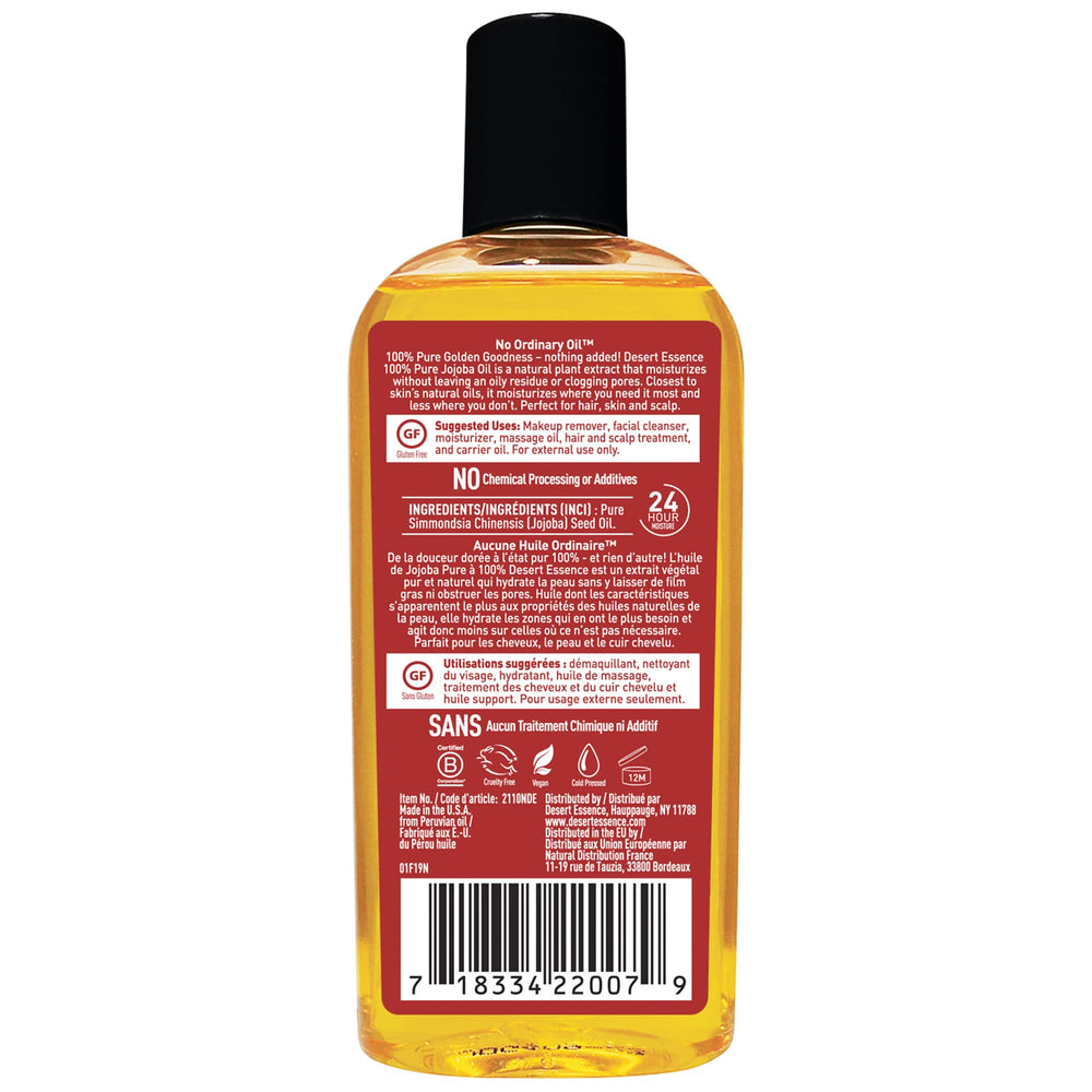 Desert Essence Jojoba Oil on hair application for lightweight conditioning.