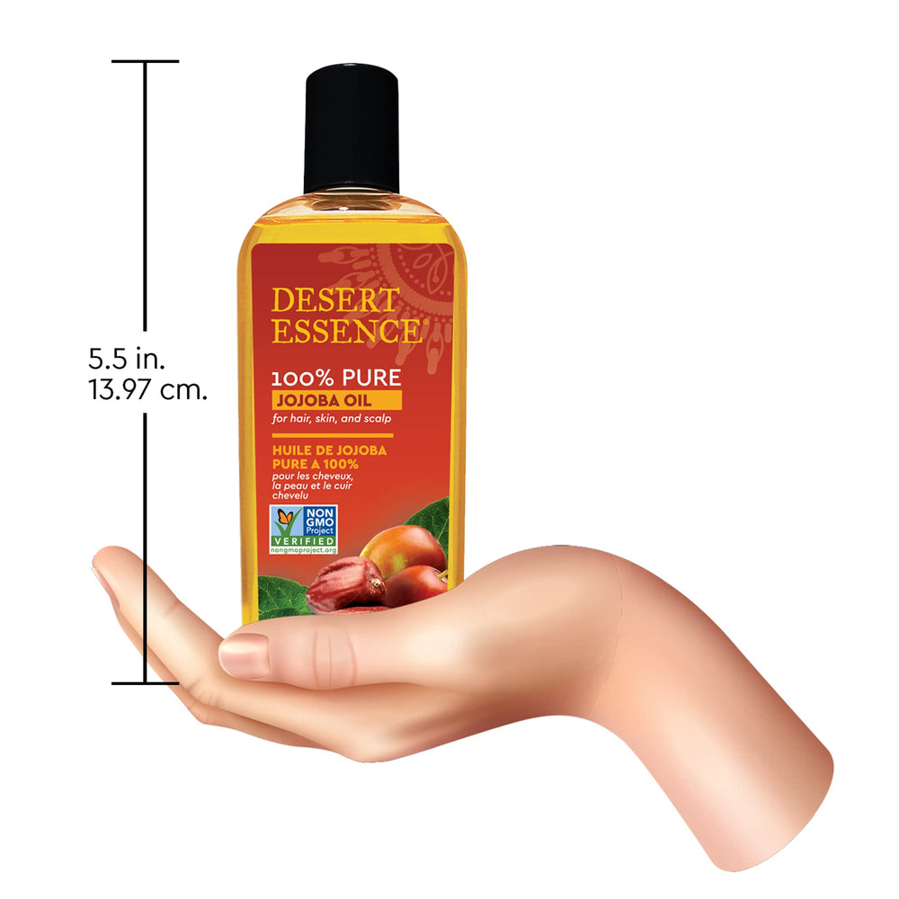 Desert Essence Jojoba Oil dry hair treatment and scalp nourishment.