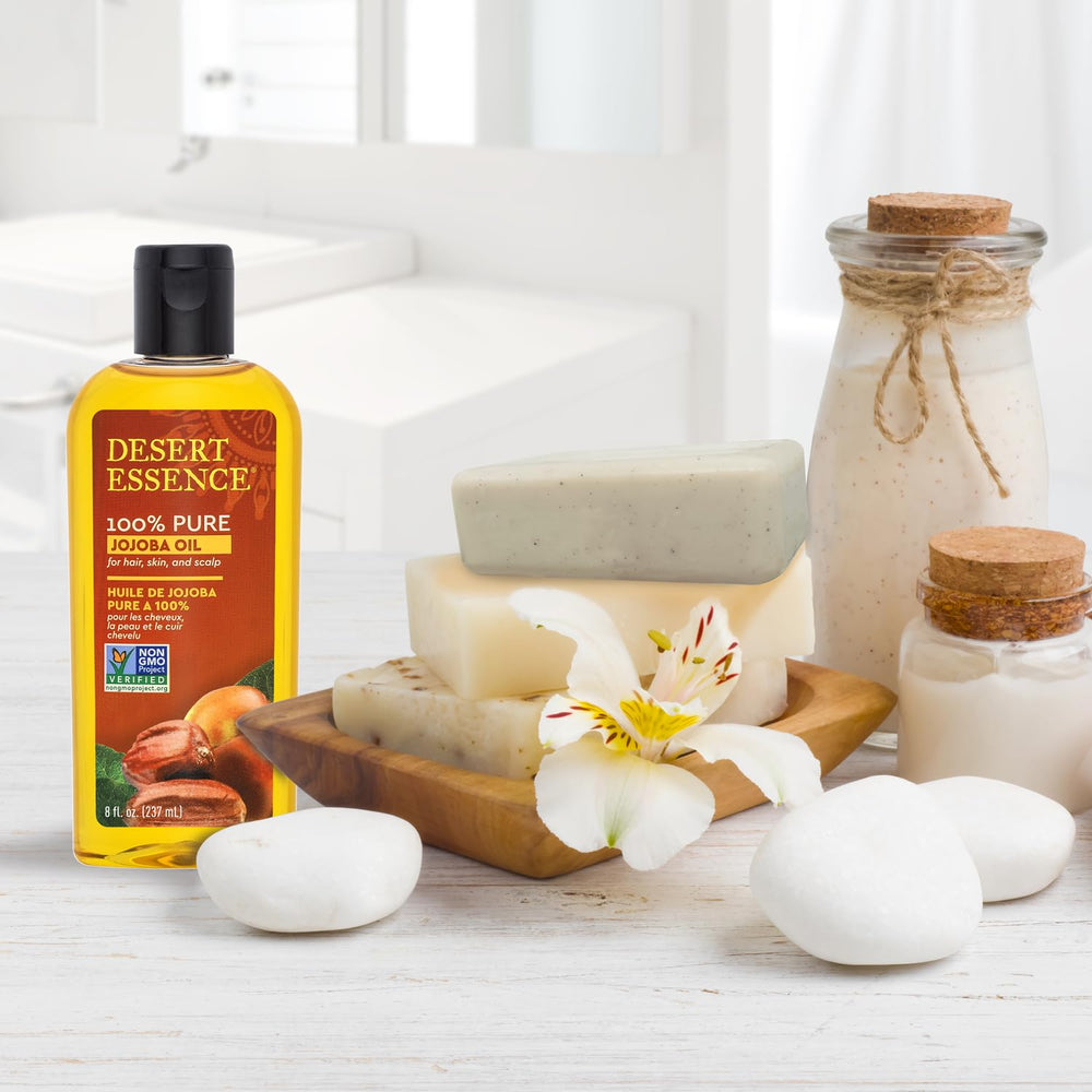 Desert Essence jojoba oil scalp treatment balances moisture for healthier hair.