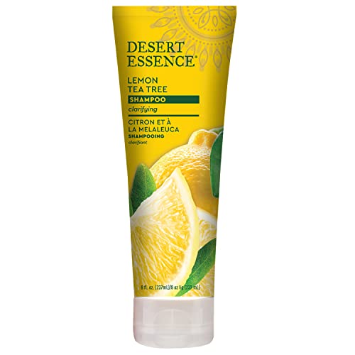 Desert Essence Lemon Tea Tree Shampoo bottle back highlights ingredients supporting scalp balance.