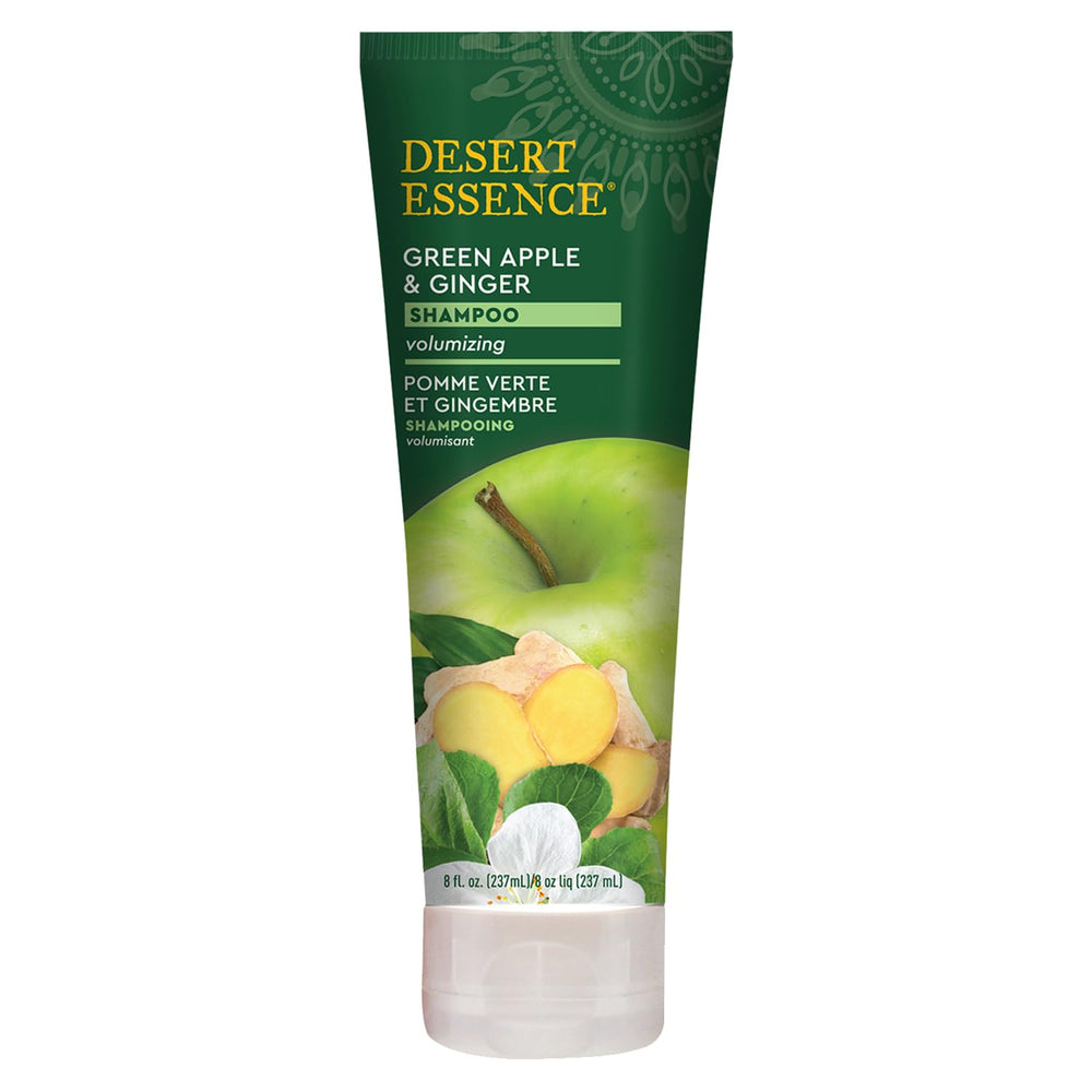 Desert Essence thickening shampoo pour capturing rich lather and easy distribution.