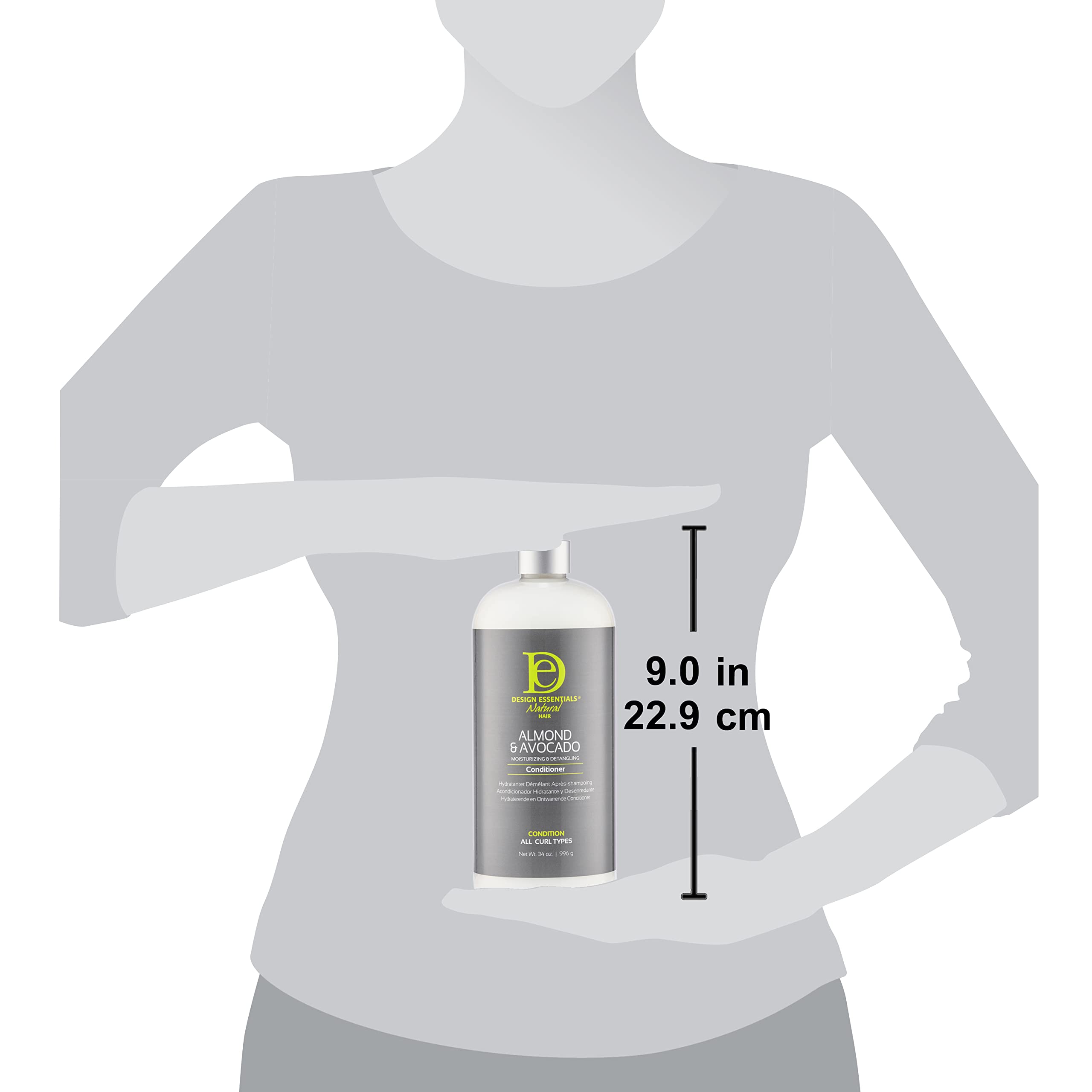 Design Essentials almond avocado conditioner on color-treated hair under natural light.