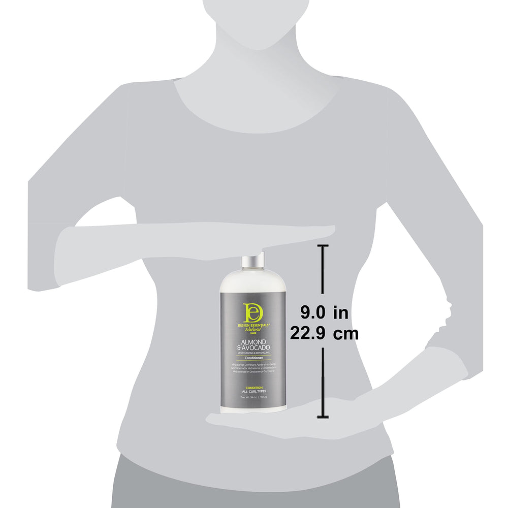 Design Essentials almond avocado conditioner on color-treated hair under natural light.