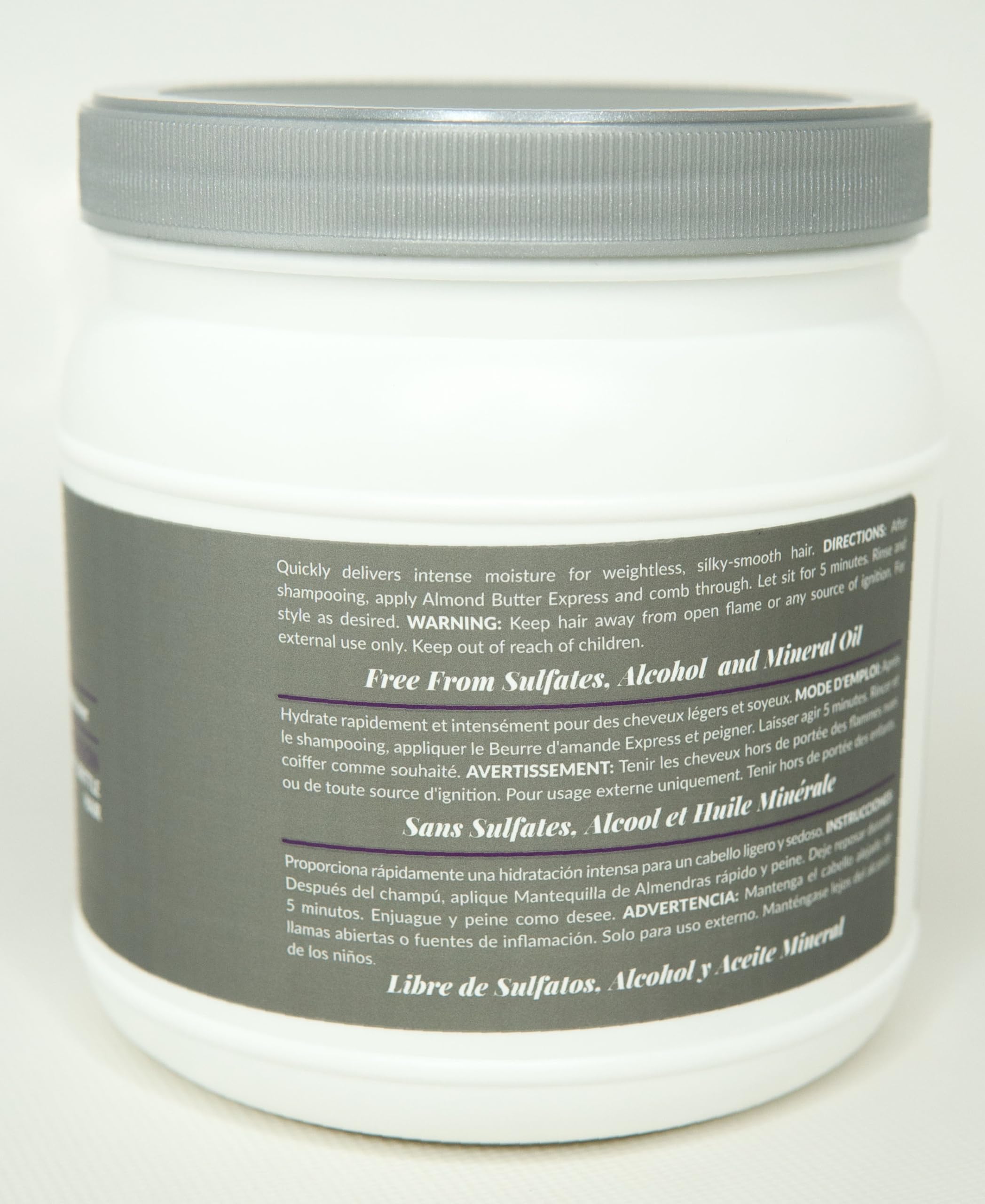 Design Essentials Almond Butter Express cream texture highlights rich moisture for detangling.