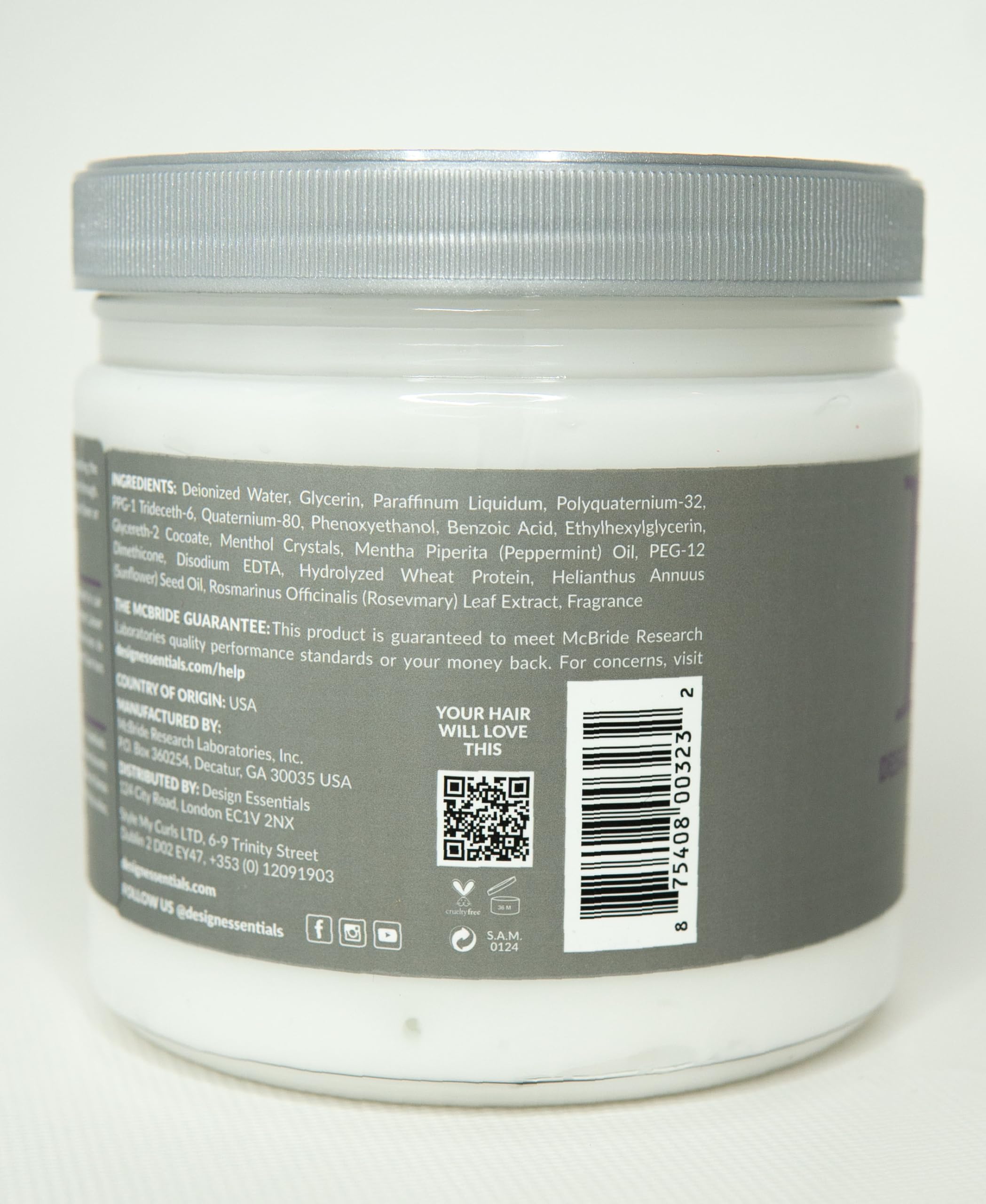 Design Essentials Rosemary & Mint conditioner being applied to hair demonstrates detangling and smoothness
