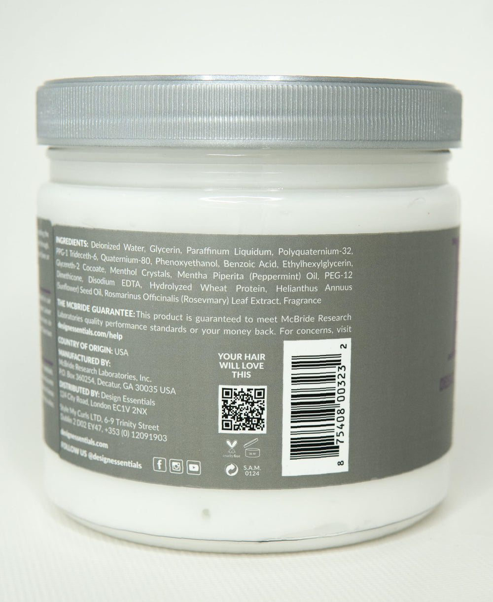 Design Essentials Rosemary & Mint conditioner being applied to hair demonstrates detangling and smoothness