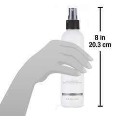 Design Essentials Wave By Design Mist bottle applying shine to curly hair for a glossy finish.