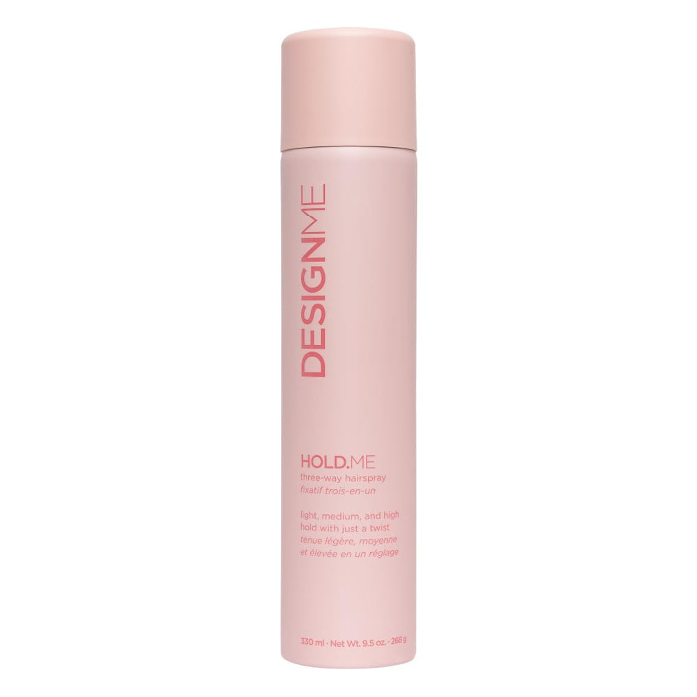 Design.Me HOLD.ME hairspray bottle close-up showing versatile three-way hold.
