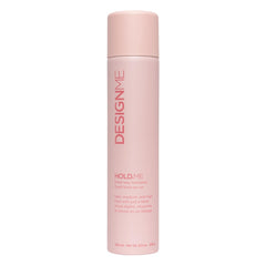 Design.Me HOLD.ME hairspray bottle close-up showing versatile three-way hold.