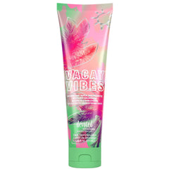 Devoted Creations Vacay Vibes bottle closeup highlights tropical bronzer and hydration