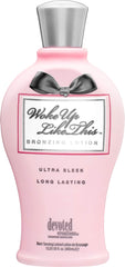 Devoted Creations WOKE UP LIKE THIS bronzing lotion bottle for a sun-kissed glow and smooth skin