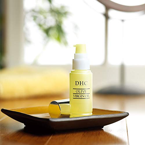 DHC Olive Virgin Oil applied to skin demonstrates quick absorption with no residue.