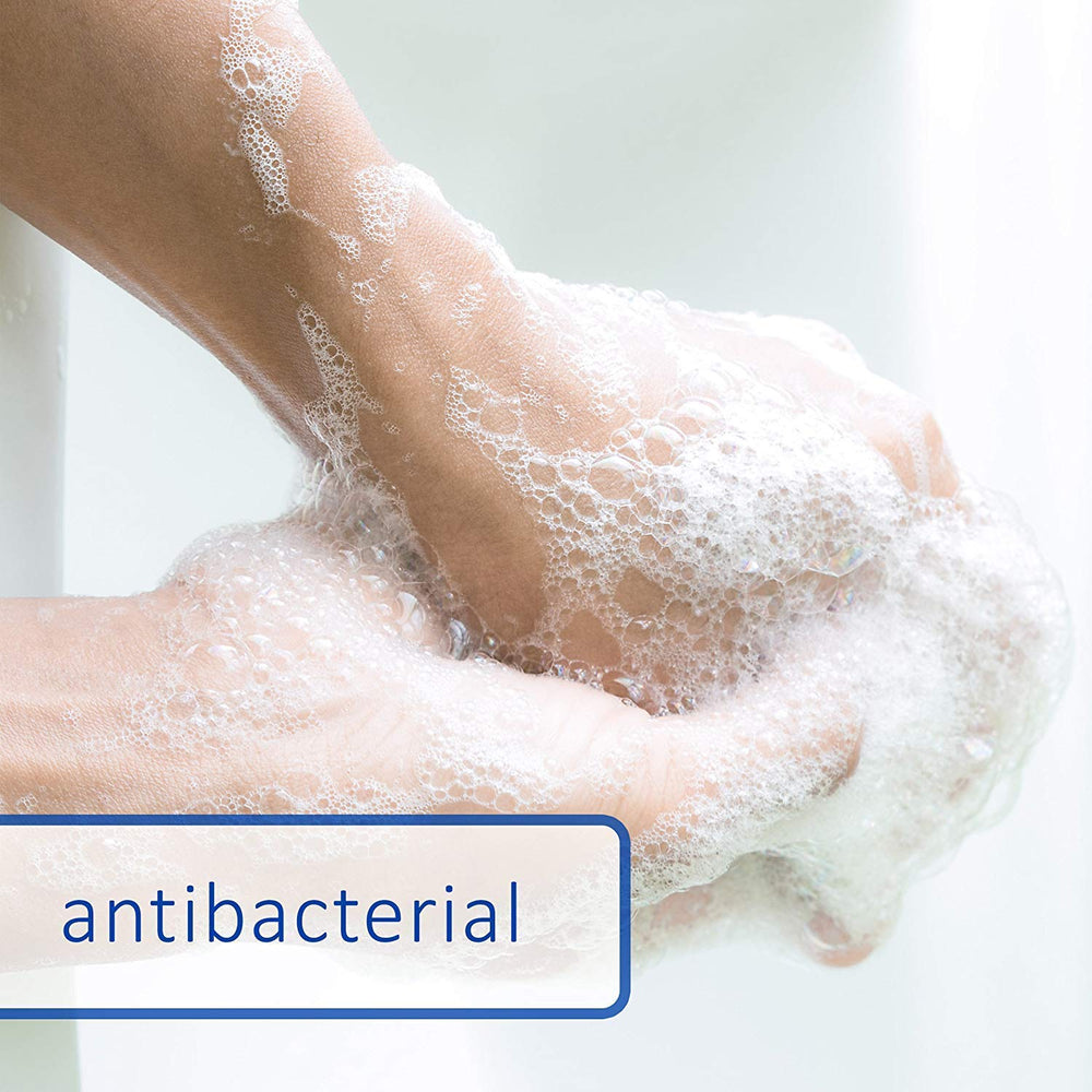 Dial antibacterial bar soap with running water showing clean rinse.