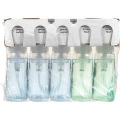 Dial Complete spring water bottle close-up highlights creamy foam and gentle cleanse