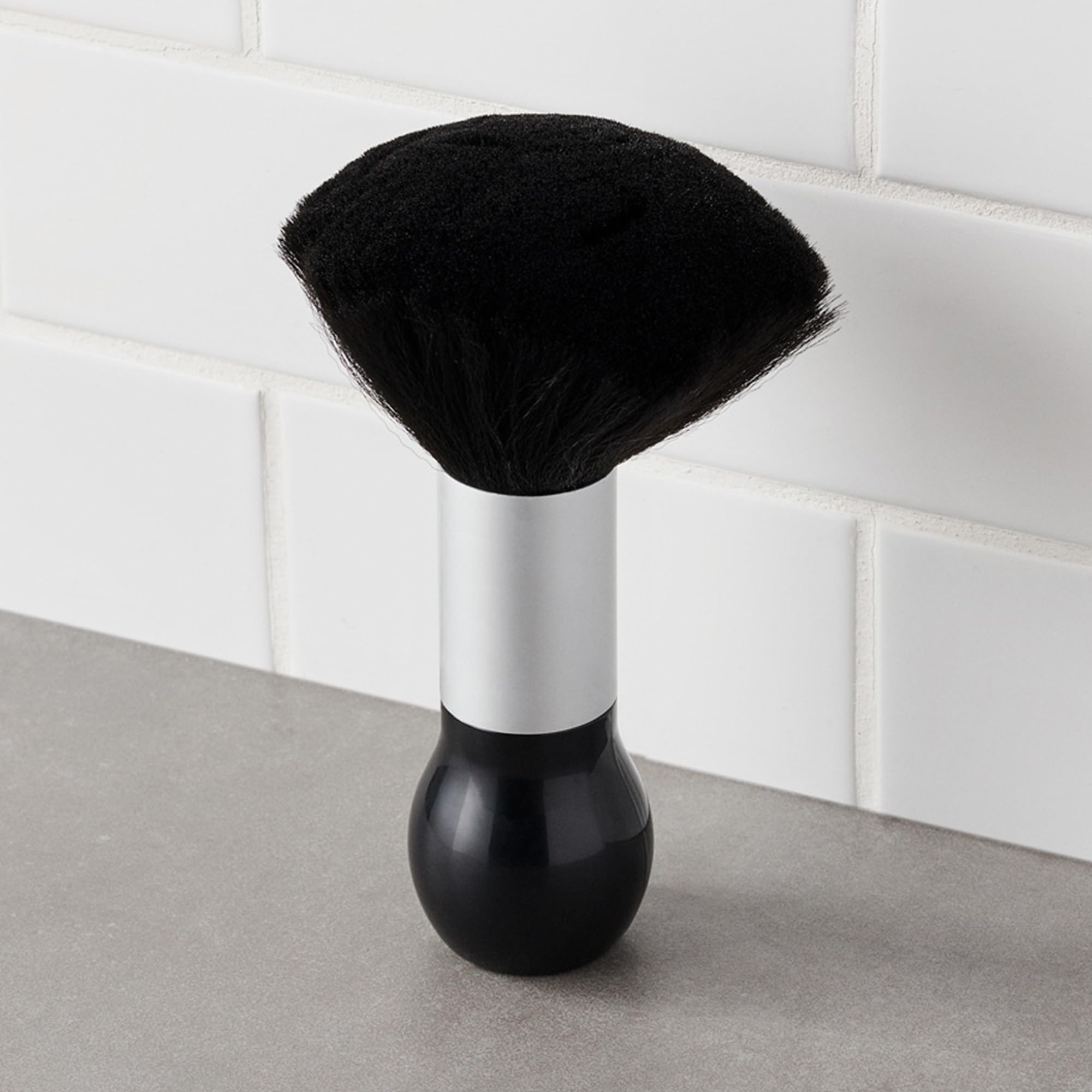 Diane neck duster brush in salon use for quick neck and ear cleanup after cuts.